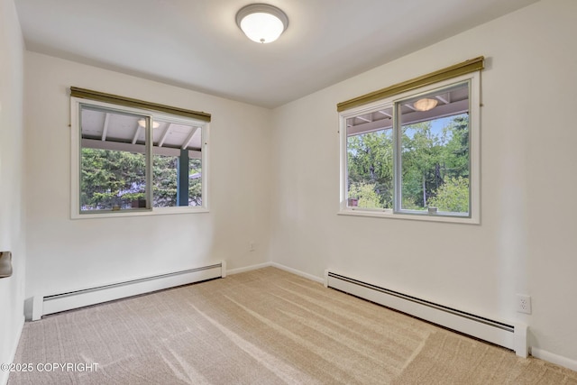 13120 Saunders Rd, Anchorage, AK 99516 - carpeted empty room with baseboard heating, healthy amount of natural light, and baseboards