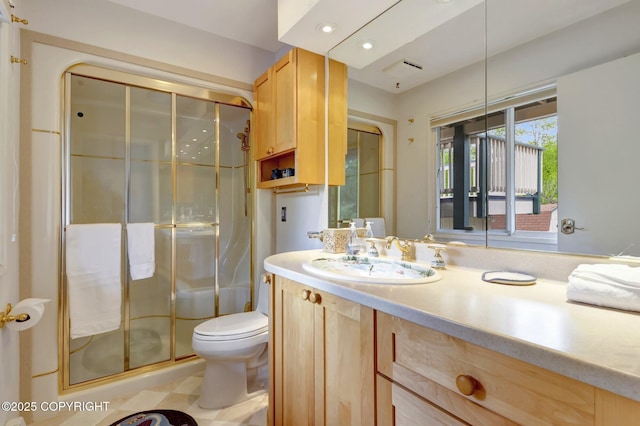13120 Saunders Rd, Anchorage, AK 99516 - full bathroom with a shower stall, vanity, toilet, and recessed lighting