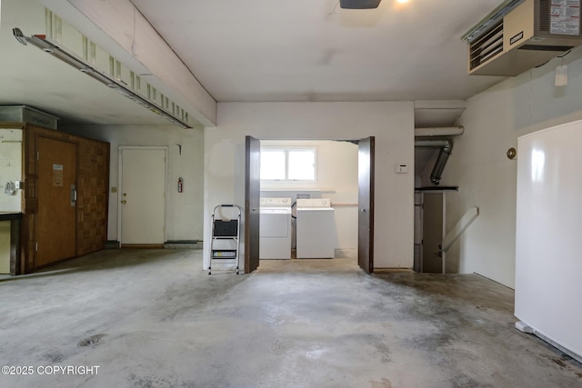 13120 Saunders Rd, Anchorage, AK 99516 - garage featuring washing machine and clothes dryer and a heating unit