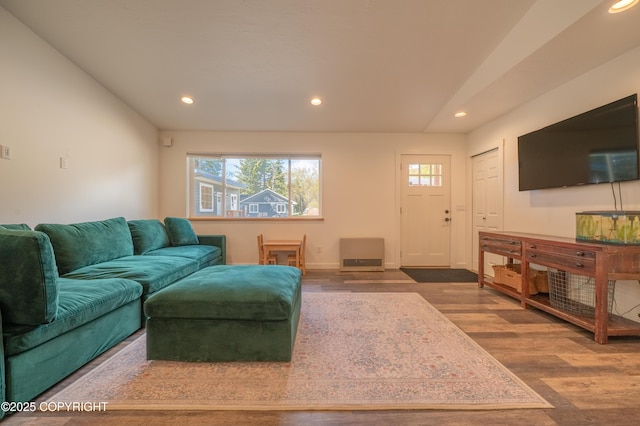 living area with wood finished floors, recessed lighting, and baseboards
