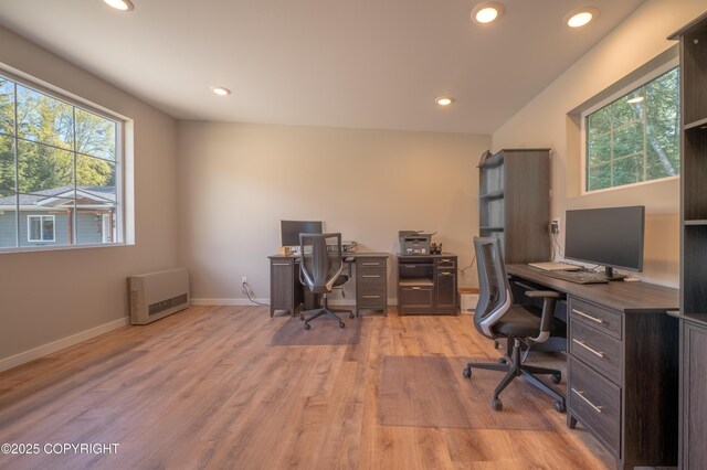 office area with light wood-type flooring, recessed lighting, and baseboards