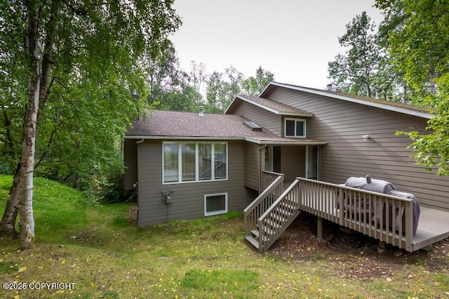 19532 Ostovia Cir, Eagle River, AK 99577 - rear view of property with a yard and a deck