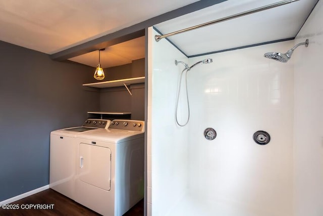 19532 Ostovia Cir, Eagle River, AK 99577 - clothes washing area featuring dark wood-type flooring, laundry area, separate washer and dryer, and baseboards