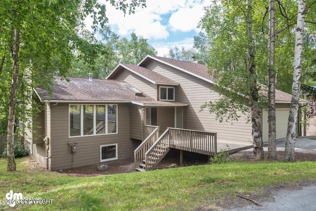 19532 Ostovia Cir, Eagle River, AK 99577 - back of property with roof with shingles, stairs, a garage, a deck, and a lawn