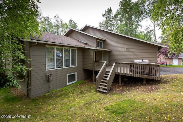 19532 Ostovia Cir, Eagle River, AK 99577 - back of house with a yard, a wooden deck, stairs, and roof with shingles