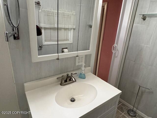 22539 Needles Loop, Chugiak, AK 99567 - bathroom with walk in shower and vanity