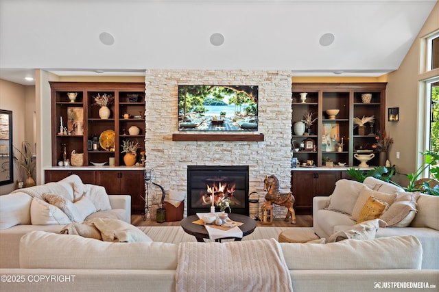 14009 W Big Lake Rd, Big Lake, AK 99652 - living area with a fireplace and wood finished floors