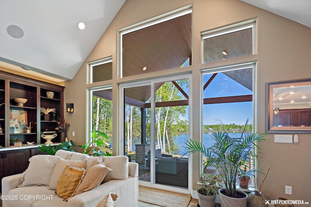 14009 W Big Lake Rd, Big Lake, AK 99652 - living room with a water view, recessed lighting, and high vaulted ceiling