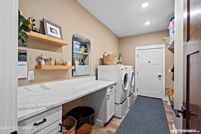 14009 W Big Lake Rd, Big Lake, AK 99652 - laundry room featuring separate washer and dryer, light wood-type flooring, cabinet space, and recessed lighting