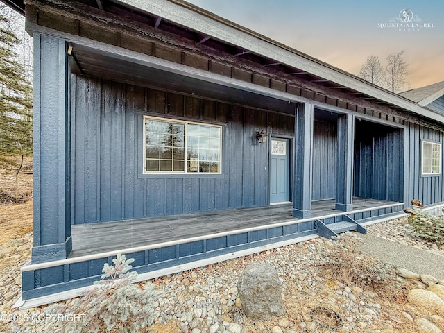 1340 N Rainbow Park Dr, Wasilla, AK 99623 - property entrance with board and batten siding and a porch
