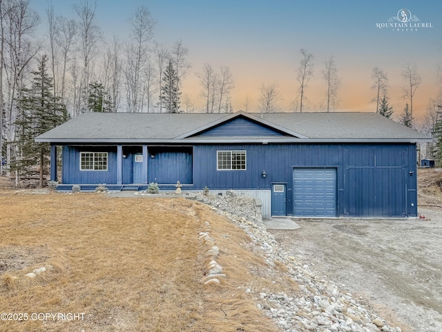 1340 N Rainbow Park Dr, Wasilla, AK 99623 - single story home featuring an attached garage, covered porch, and driveway