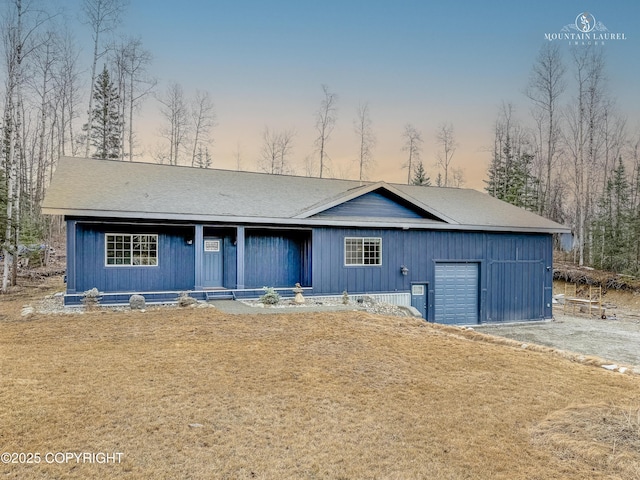 1340 N Rainbow Park Dr, Wasilla, AK 99623 - view of front of property with covered porch and a garage