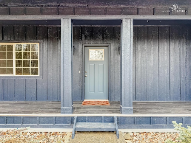 1340 N Rainbow Park Dr, Wasilla, AK 99623 - doorway to property with board and batten siding