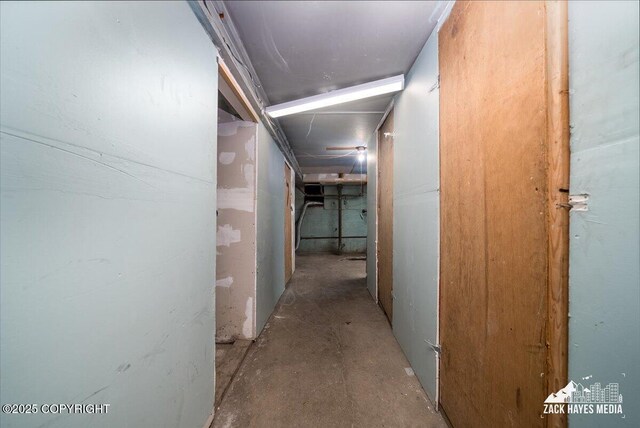 906 W 29th Pl, Anchorage, AK 99503 - corridor featuring concrete flooring