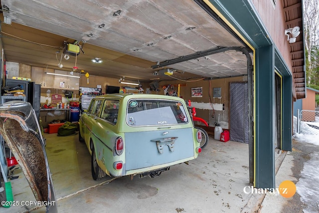 garage featuring a garage door opener