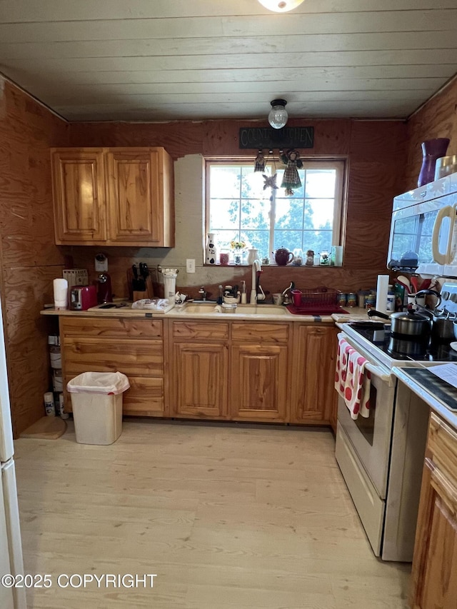 30258 Hook Ln, Soldotna, AK 99669 - kitchen featuring white appliances, light wood-style flooring, light countertops, and wood ceiling