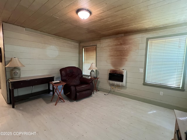 30258 Hook Ln, Soldotna, AK 99669 - living area featuring heating unit, wooden ceiling, wood finished floors, and wooden walls