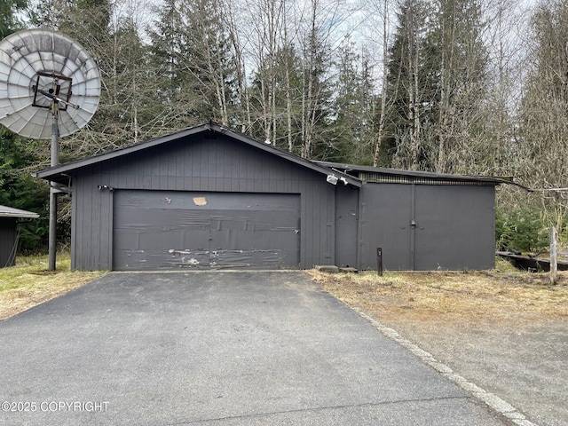 garage with driveway