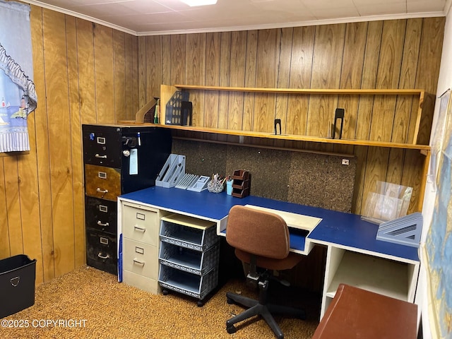 home office with wooden walls, carpet flooring, and crown molding