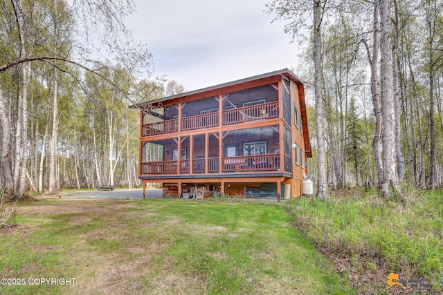 49635 S Hunter Dr, Willow, AK 99688 - rear view of property featuring a lawn and a deck
