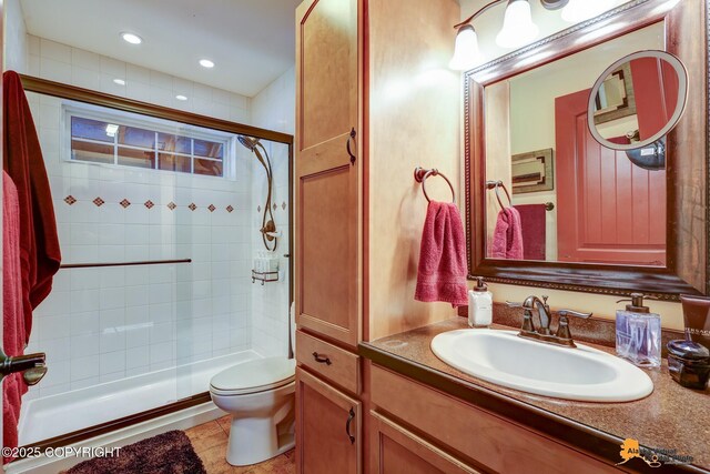 49635 S Hunter Dr, Willow, AK 99688 - full bathroom featuring tiled shower, toilet, vanity, and recessed lighting