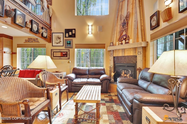 49635 S Hunter Dr, Willow, AK 99688 - living area with a high ceiling, plenty of natural light, and a fireplace