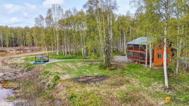 49635 S Hunter Dr, Willow, AK 99688 - view of yard featuring a gazebo, a forest view, and a deck