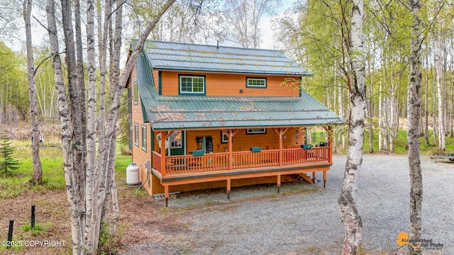 49635 S Hunter Dr, Willow, AK 99688 - chalet / cabin with covered porch and metal roof