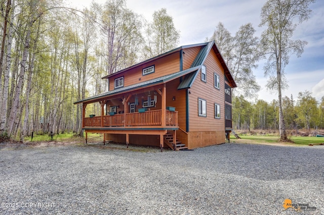 49635 S Hunter Dr, Willow, AK 99688 - chalet / cabin with a porch and metal roof