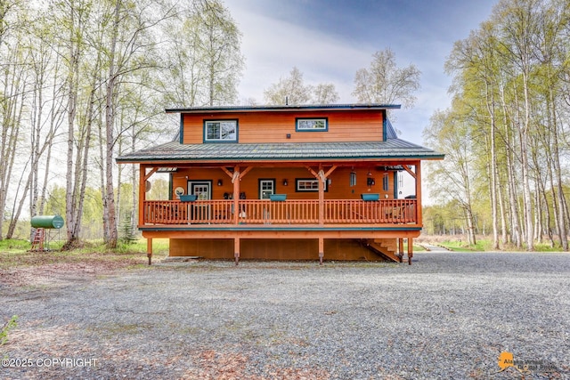49635 S Hunter Dr, Willow, AK 99688 - rustic home featuring a porch