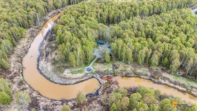 49635 S Hunter Dr, Willow, AK 99688 - aerial view of property and surrounding area featuring a heavily wooded area and a large body of water