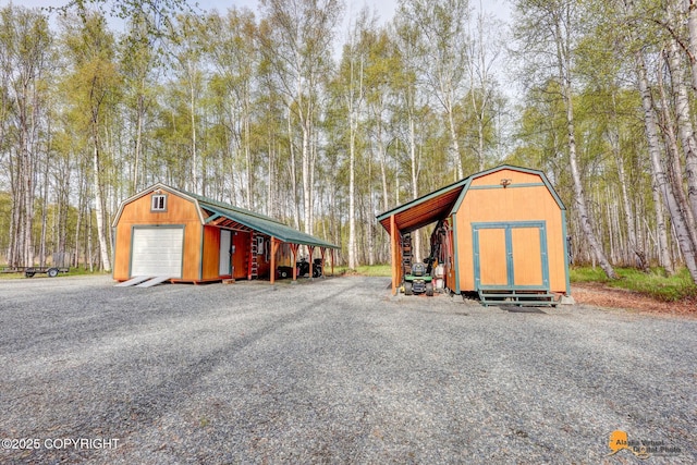 49635 S Hunter Dr, Willow, AK 99688 - view of shed with gravel driveway