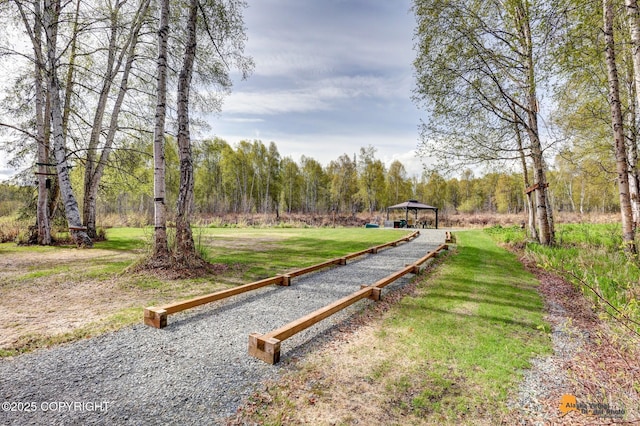 49635 S Hunter Dr, Willow, AK 99688 - view of grassy yard featuring a gazebo and a view of trees