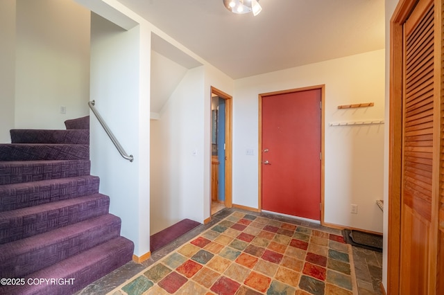 2435 Paradise Pl, Homer, AK 99603 - entryway with stairway and baseboards