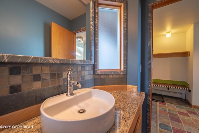 2435 Paradise Pl, Homer, AK 99603 - bathroom featuring a baseboard heating unit and vanity