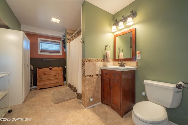 2435 Paradise Pl, Homer, AK 99603 - full bathroom with vanity, toilet, curtained shower, and tile walls