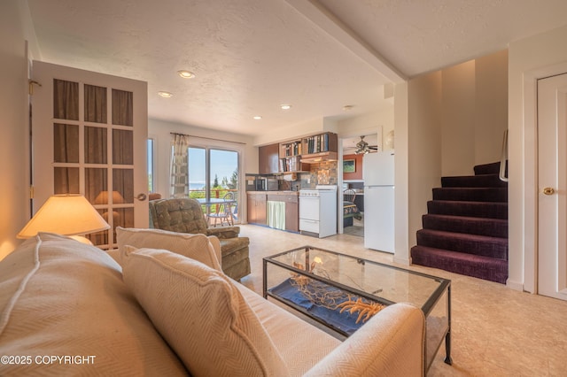 2435 Paradise Pl, Homer, AK 99603 - living area featuring recessed lighting, stairway, and a textured ceiling