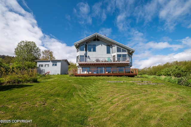 2435 Paradise Pl, Homer, AK 99603 - rear view of property featuring a yard, a balcony, and a wooden deck