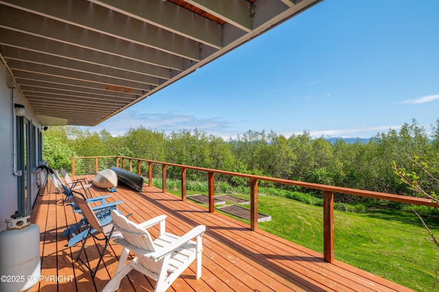 2435 Paradise Pl, Homer, AK 99603 - wooden deck with a yard, a grill, and a forest view