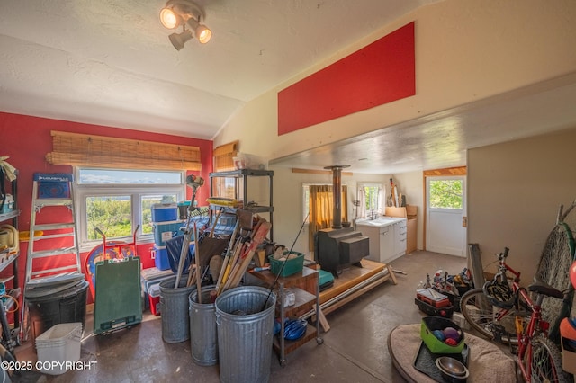 2435 Paradise Pl, Homer, AK 99603 - misc room featuring concrete flooring and vaulted ceiling