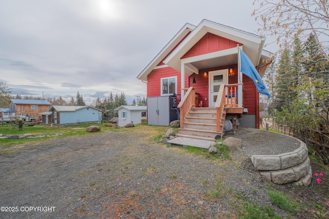 437 W Fairview Ave, Homer, AK 99603 - view of front facade with board and batten siding