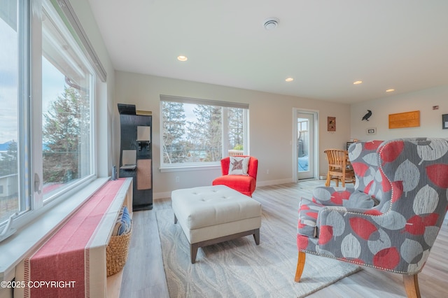 437 W Fairview Ave, Homer, AK 99603 - living area with wood finished floors, recessed lighting, and baseboards