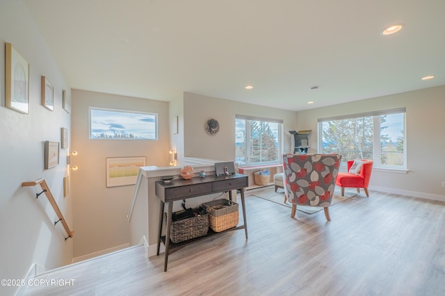 437 W Fairview Ave, Homer, AK 99603 - living area featuring light wood-style floors, baseboards, and recessed lighting