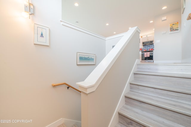 437 W Fairview Ave, Homer, AK 99603 - stairs featuring recessed lighting, wood finished floors, and baseboards