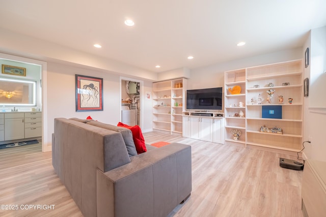 437 W Fairview Ave, Homer, AK 99603 - living room featuring light wood finished floors and recessed lighting
