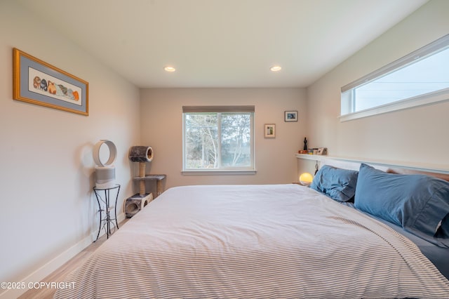 437 W Fairview Ave, Homer, AK 99603 - bedroom featuring multiple windows, wood finished floors, recessed lighting, and baseboards