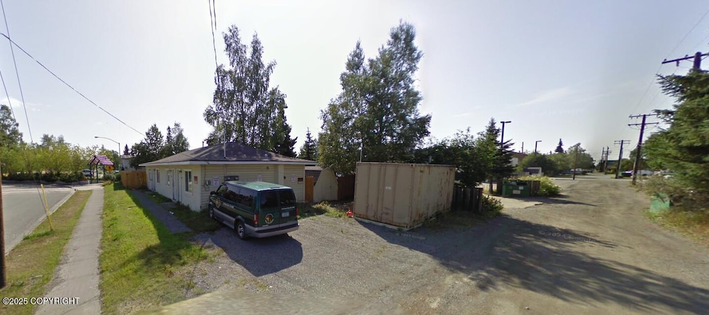 934 Medfra St, Anchorage, AK 99501 - view of front of house with driveway