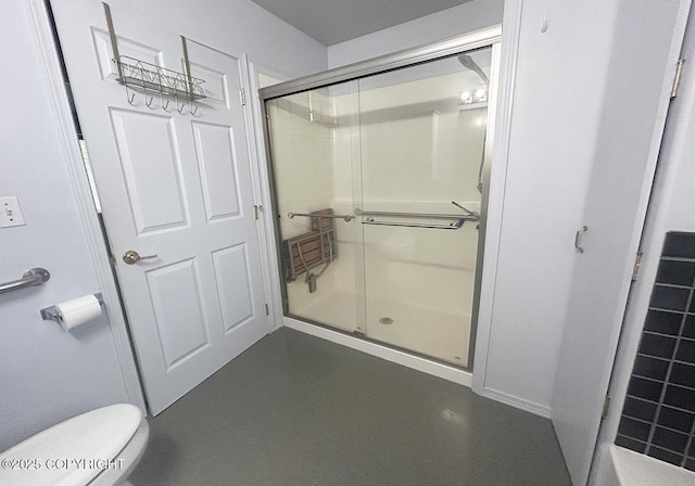 3698 Poppy Cir, Homer, AK 99603 - bathroom featuring a stall shower and toilet