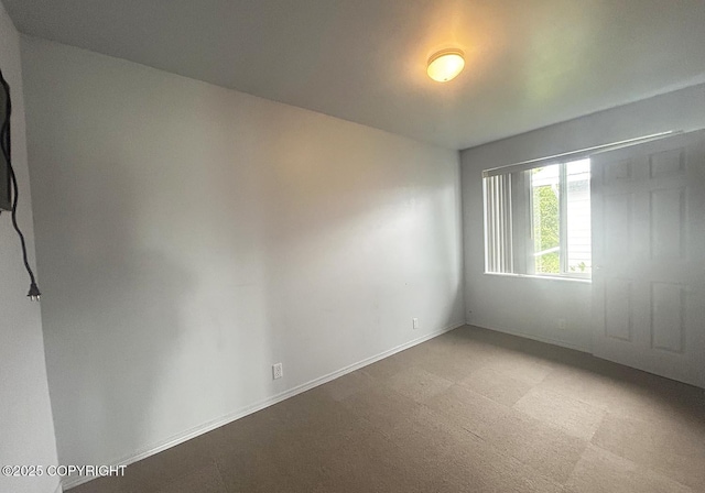 3698 Poppy Cir, Homer, AK 99603 - empty room featuring light carpet and baseboards
