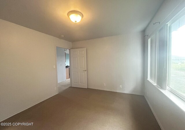 3698 Poppy Cir, Homer, AK 99603 - carpeted spare room with baseboards